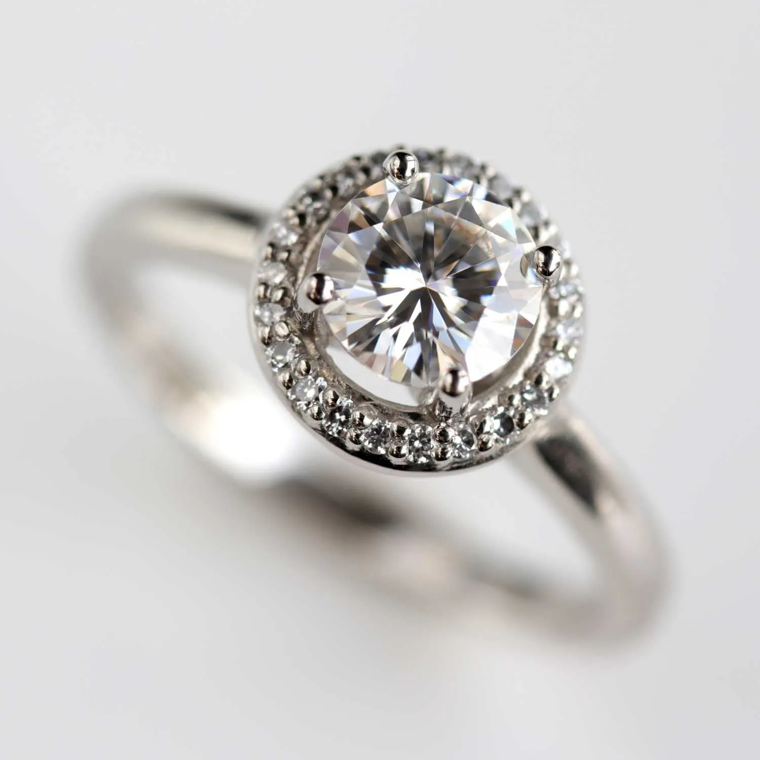 Prong-set Halo Solitaire Engagement Ring